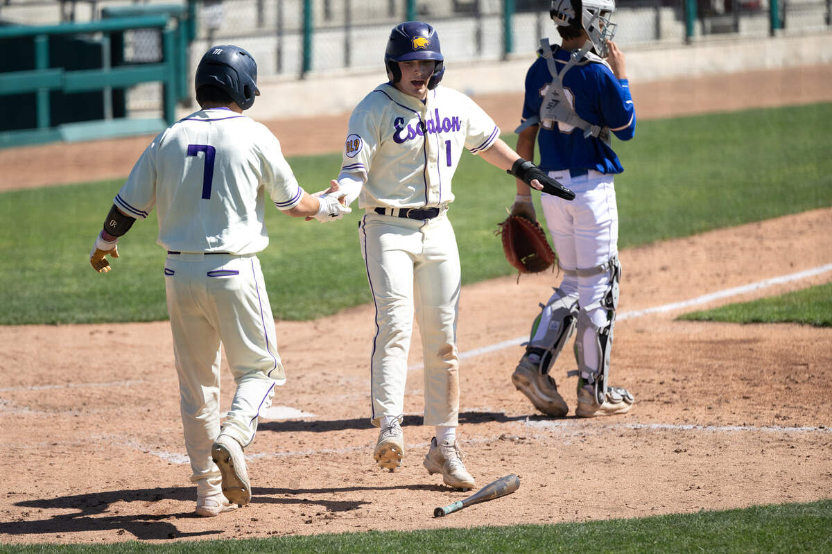Escalon’s Jamin Miller (1) scores during the Modesto Nuts High School Baseball Showcase game with Linden at John Thurman Field in Modesto, Calif., Saturday, March 16, 2024. Linden won the game 11-8.