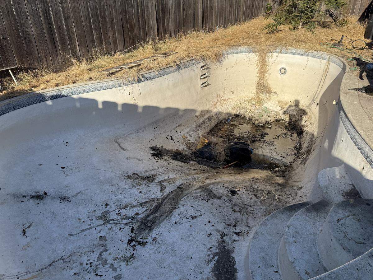 The scene where firefighters rescued a Modesto man from the sludge at the bottom of his pool on Tuesday, July 29, 2025.