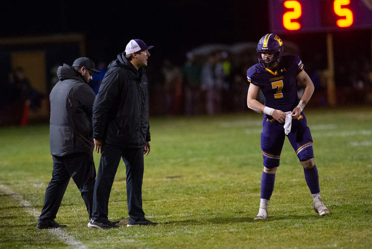 Escalon head coach Andrew Beam calls a play for quarterback Donovan Rozevink during the CIF State Division 4-AA Football Championship game with Northwood in Escalon, Calif., Saturday, Dec. 10, 2022.