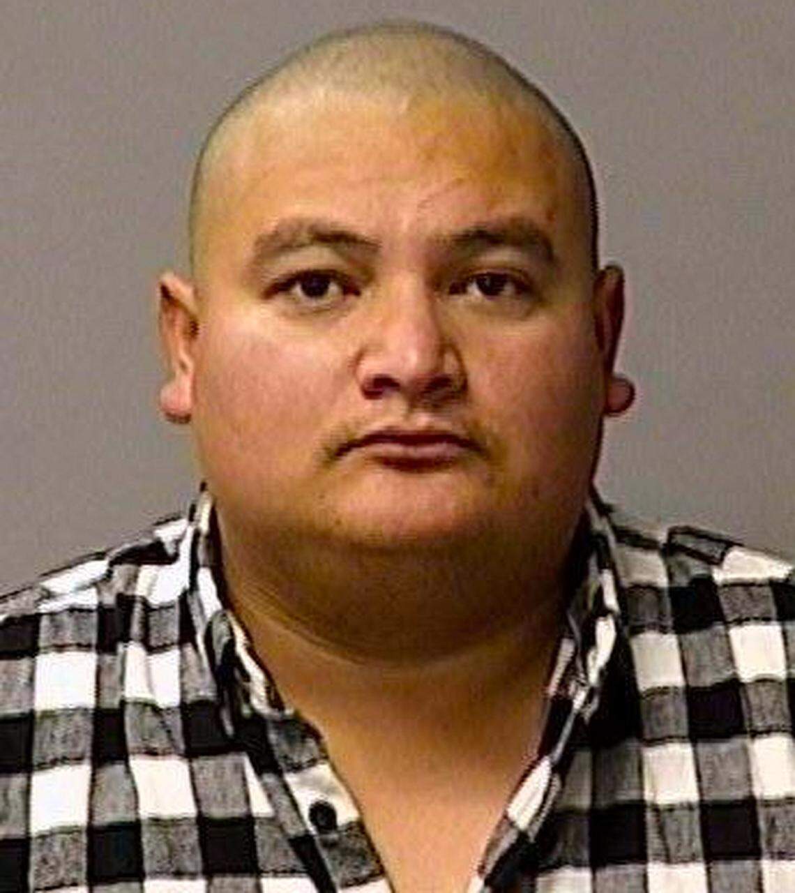 The booking mug of Gustavo Perez Arriaga, 32, who was arrested Friday in Lamont, California, in connecting with the shooting death of Newman Police Department Corporal Ronil Singh on Wednesday, Dec. 26, 2018.