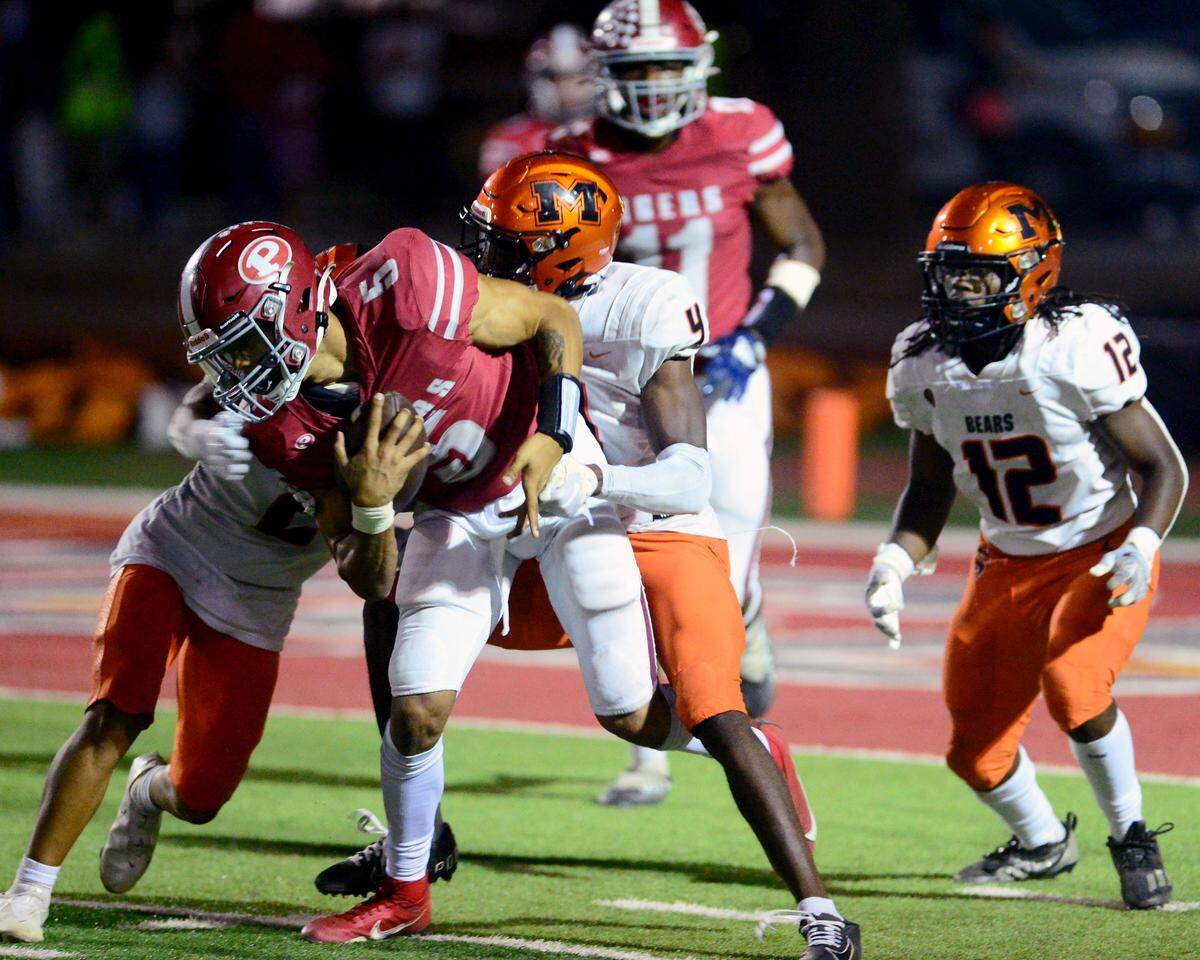 Patterson receiver Donjhae Hardin (5) fights through multiple defenders for extra yards during a game between Patterson and Merced at Patterson High School in Patterson California on September 29, 2023.
