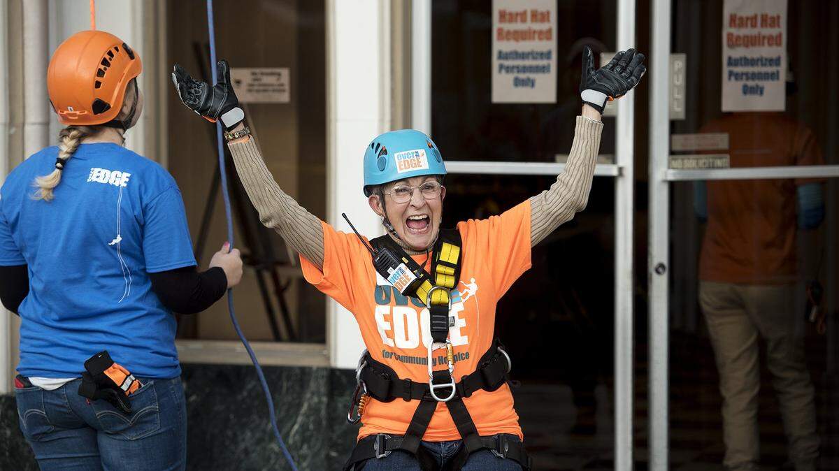 Modesto City Council member Jenny Kenoyer in this file photo celebrates after repelling down the side of the the historic downtown Stockton Medico-Dental Tower during the 2016 Community Hospice fundraiser Over the Edge. She announced on Sept. 11, 2018, that she has been diagnosed with lung cancer.