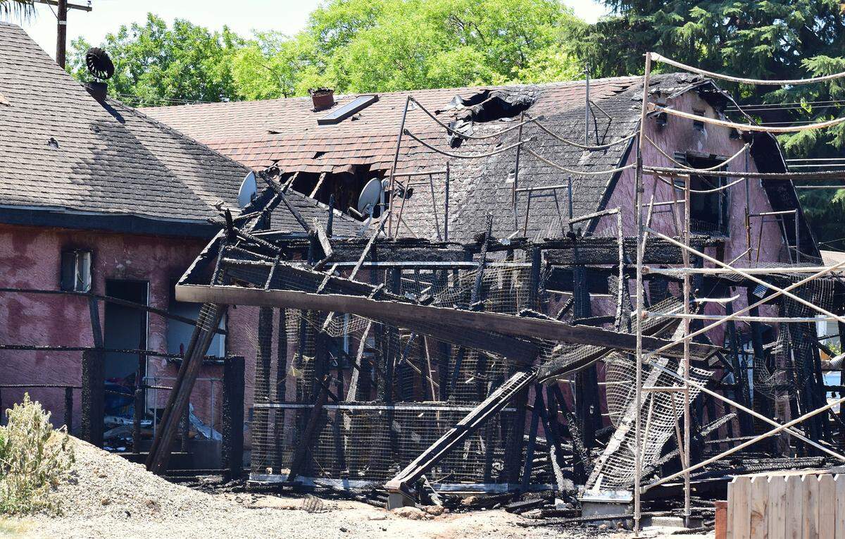The remnants of a home under construction that caught fire in the early morning hours of Friday, July 5, 2024. The flames damaged two adjacent homes, displacing nine people. 