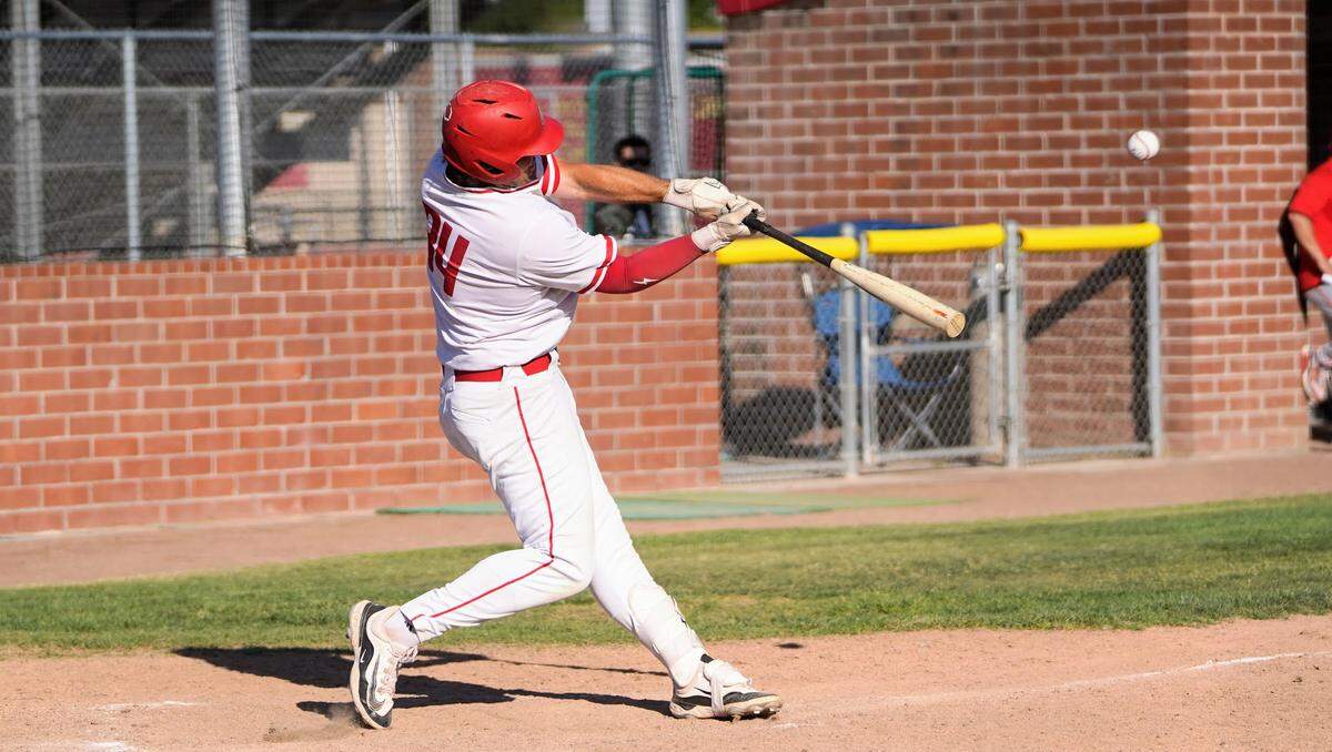Oakdale’s Landon Schutte hits a two-run home run in the bottom of the fifth inning during the Sac-Joaquin Section Division IV baseball quarterfinals against East Union at Oakdale High School on Friday, May 9, 2025.