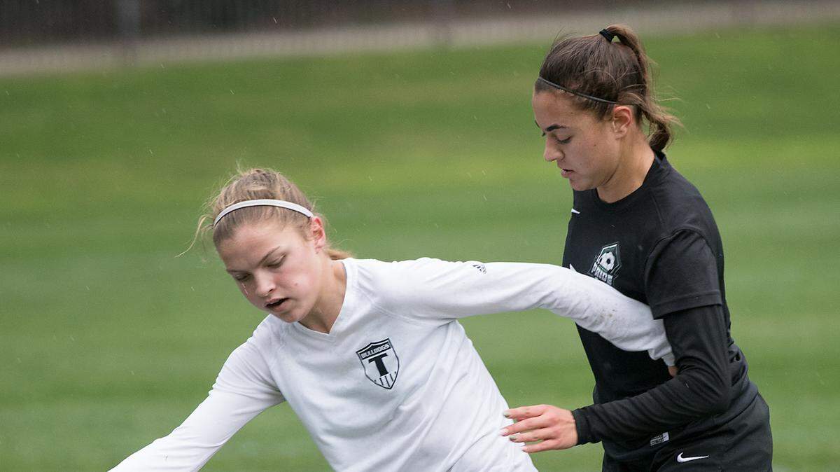 Turlock’s Kylee Redmond, left, and Pitman’s Isabella Shallou-Enes battle for the ball during the Central California Athletic League game in Turlock, Calif., Wednesday, Jan. 16, 2019. Turlock won the game 3-1.