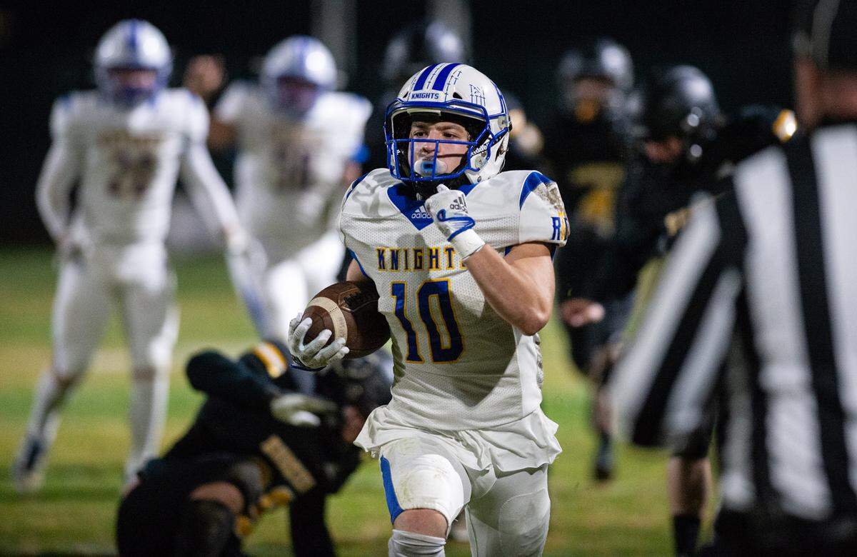 Ripon Christian’s Brady Grondz returns a kick for a touchdown during the CIF Division 5-AA Northern California Regional Bowl Game with Hughson on Friday, Dec. 2, 2022, in Hughson, Calif.