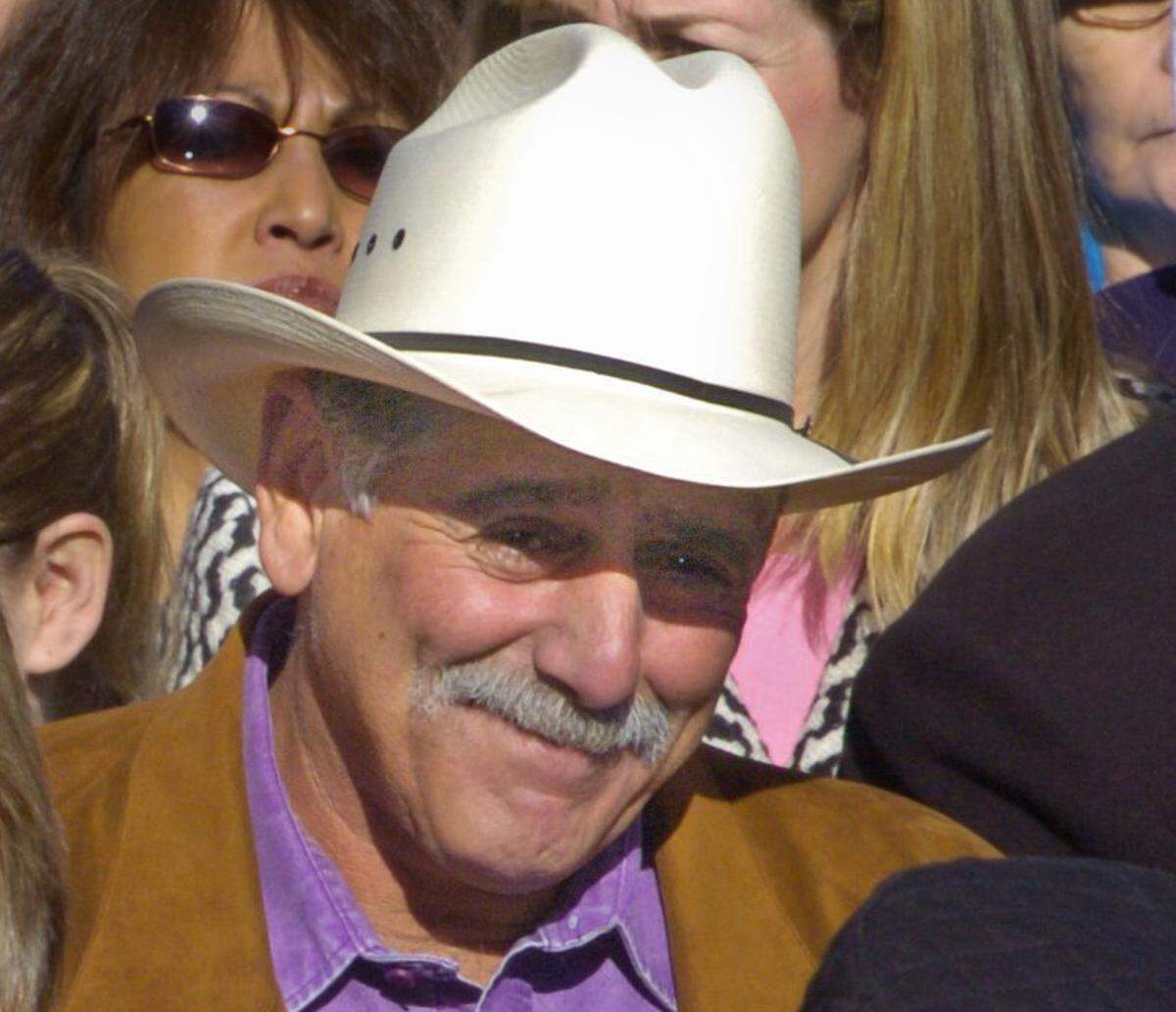 Dennis Rocha, attends the dedication ceremony for the bench placed in memory of his daughter Laci and grandson Conner Peterson at the Escalon Main Street Park on November 20, 2004.