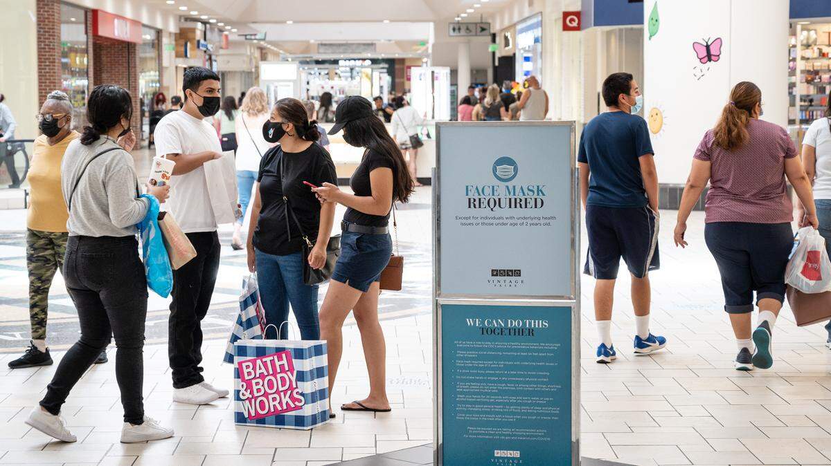 Stanislaus County issues new guidance for COVID masks. Shoppers wear masks at Vintage Faire Mall in June.