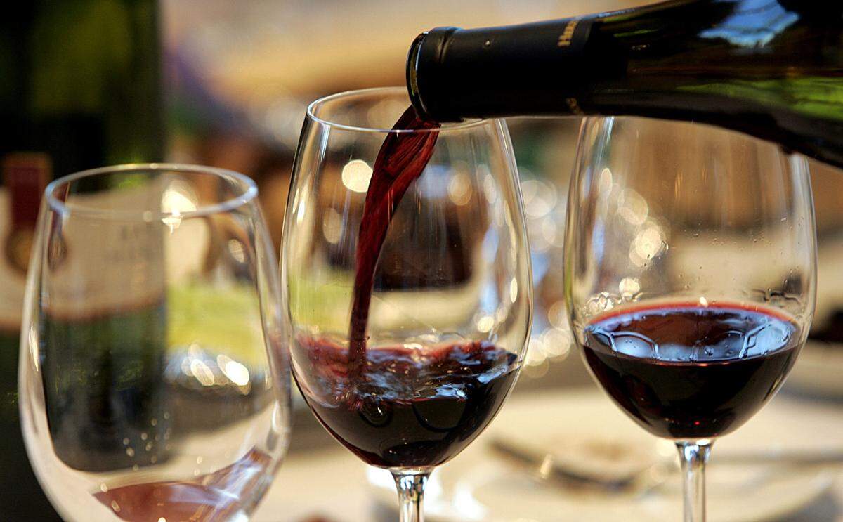 It’s best to know a restaurant’s policy on corkage fees before showing up with a bottle of your own wine. (Carlos Chavez/Los Angeles Times/TNS)