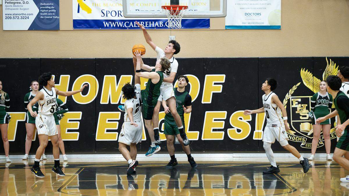 Pitman and Enochs battle it out in the Central California Athletic League game at Enochs High School in Modesto, Friday, Jan. 24, 2025. Pitman won the game 57-52.