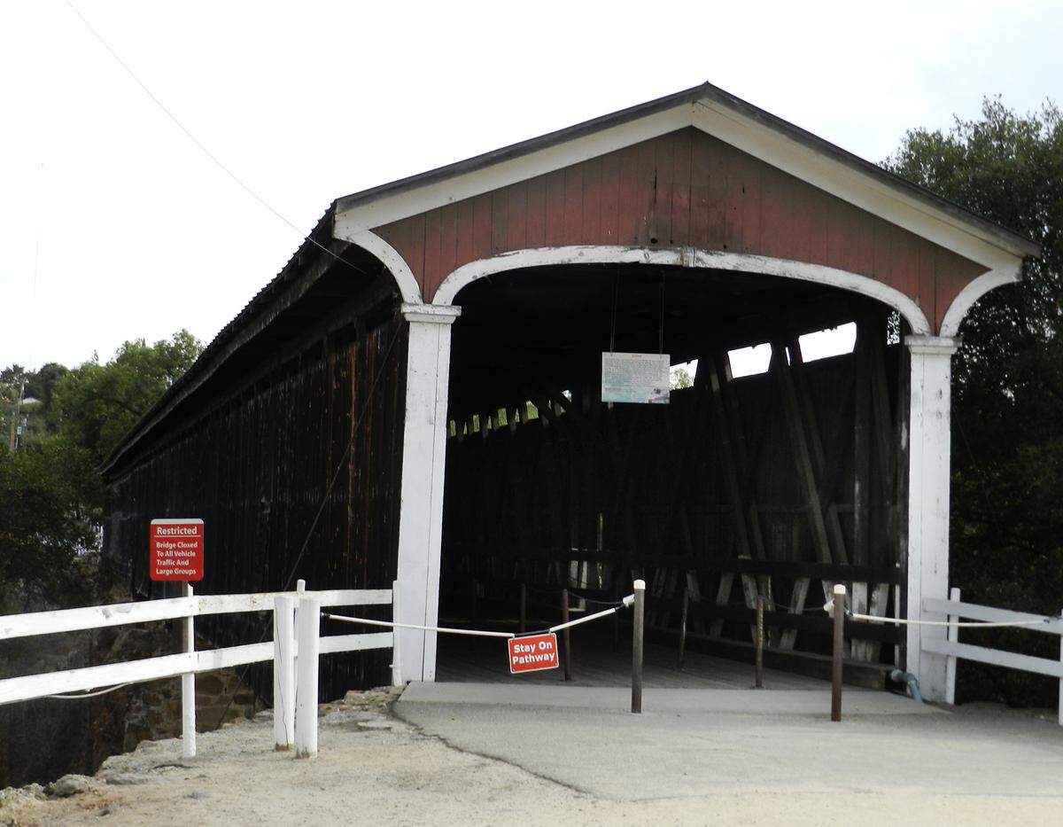 The covered bridge at Knights Ferry, pictured Oct. 8, 2013, already limited due to repairs, is completely closed to the public as repair work is done.