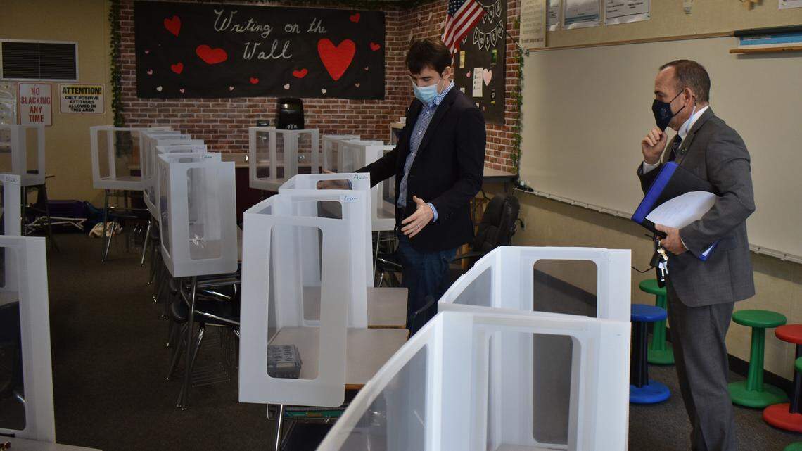 Waterford Unified Superintendent Don Davis, right, shows Rep. Josh Harder an elementary school classroom on Wednesday, Feb. 17, 2021. “Local school districts are charged with educating and developing young people, not with making policy related to public health,” the superintendent says.