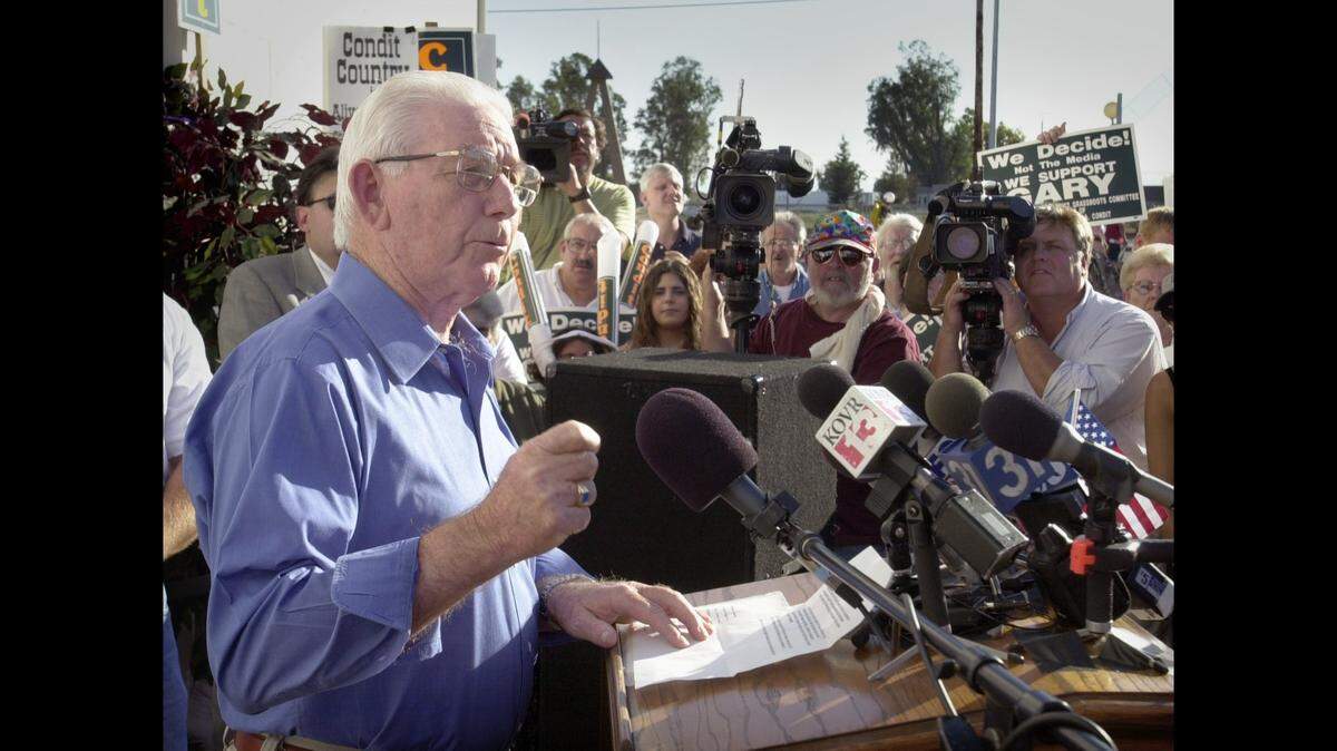 The Reverand Adrian Condit addresses a group of supporters and the media during a rally at the Assyrian-American Civic Club in Turlock, Calif., on Monday, Aug. 6, 2001.