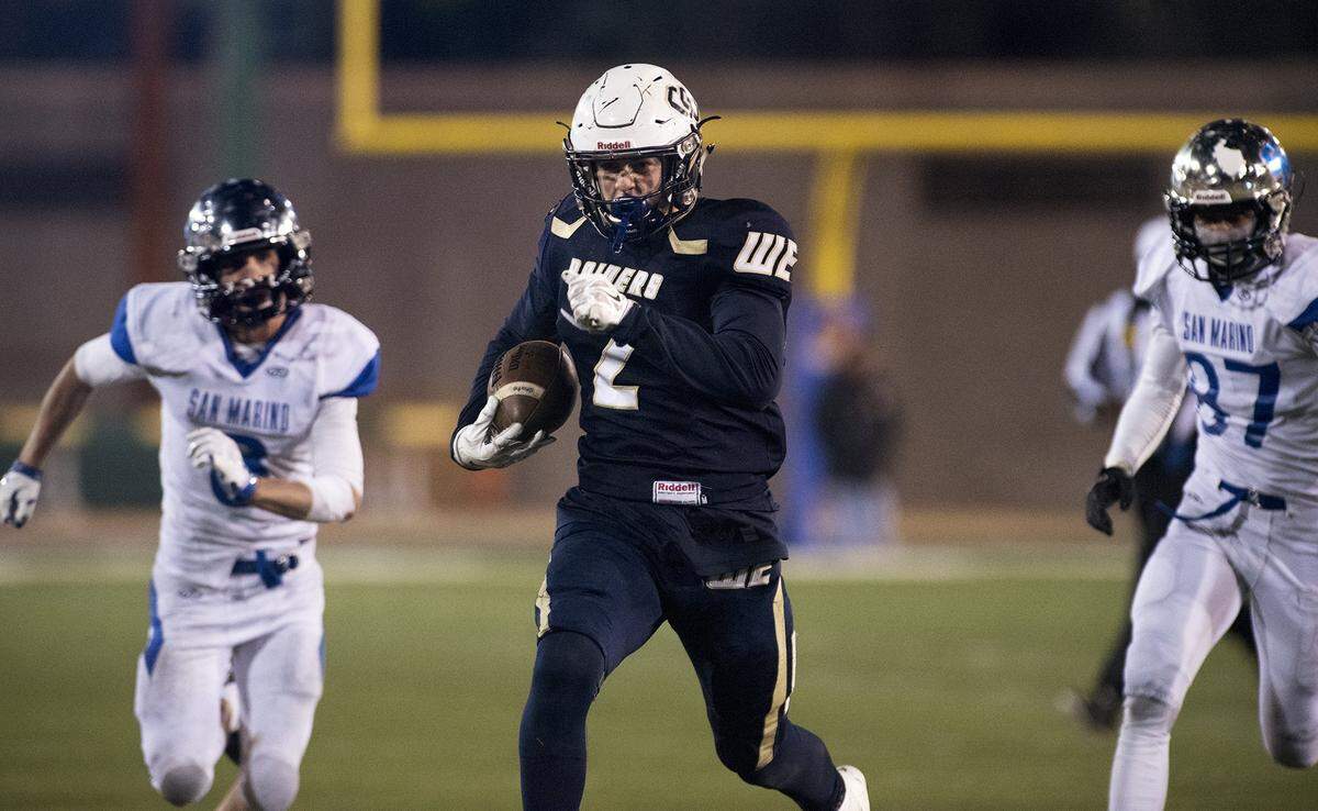 Central Catholic running back Justin Rice runs for a touchdown during the CIF Open Division Small School championship with San Marino at California State University, Sacramento, on Dec. 19, 2015.