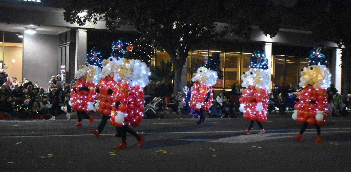 The Celebration of Lights Holiday Parade in downtown Modesto on Saturday night, Dec. 7, 2024, included a March of the Wooden Soldiers. Except they were balloon soldiers, part of the entry by My Little Balloon Co.