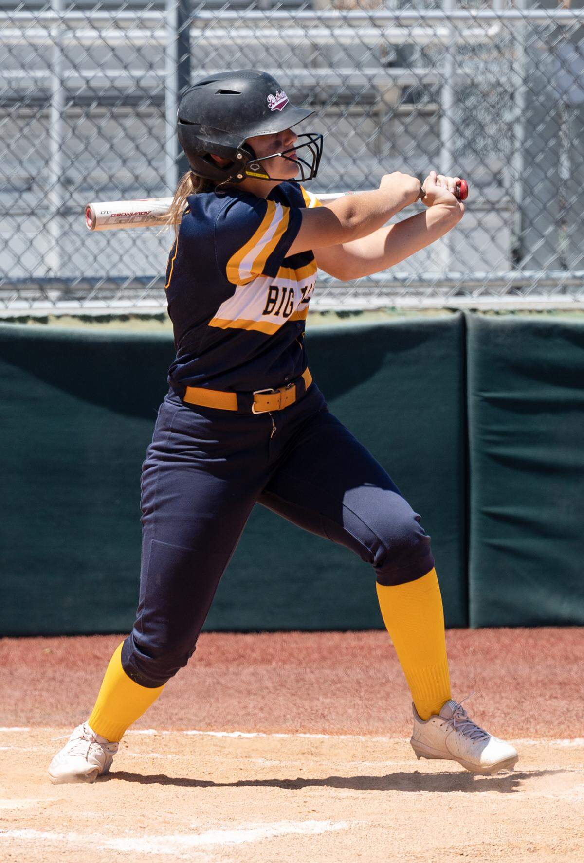 Big Valley Christian’s Cecily Fontana hits a single that scored the winning run in the Sac-Joaquin Section Softball Division VII championship game with Stone Ridge Christian at Delta College in Stockton, Calif., on Saturday, May 21, 2022. Big Valley won the game 5-3.