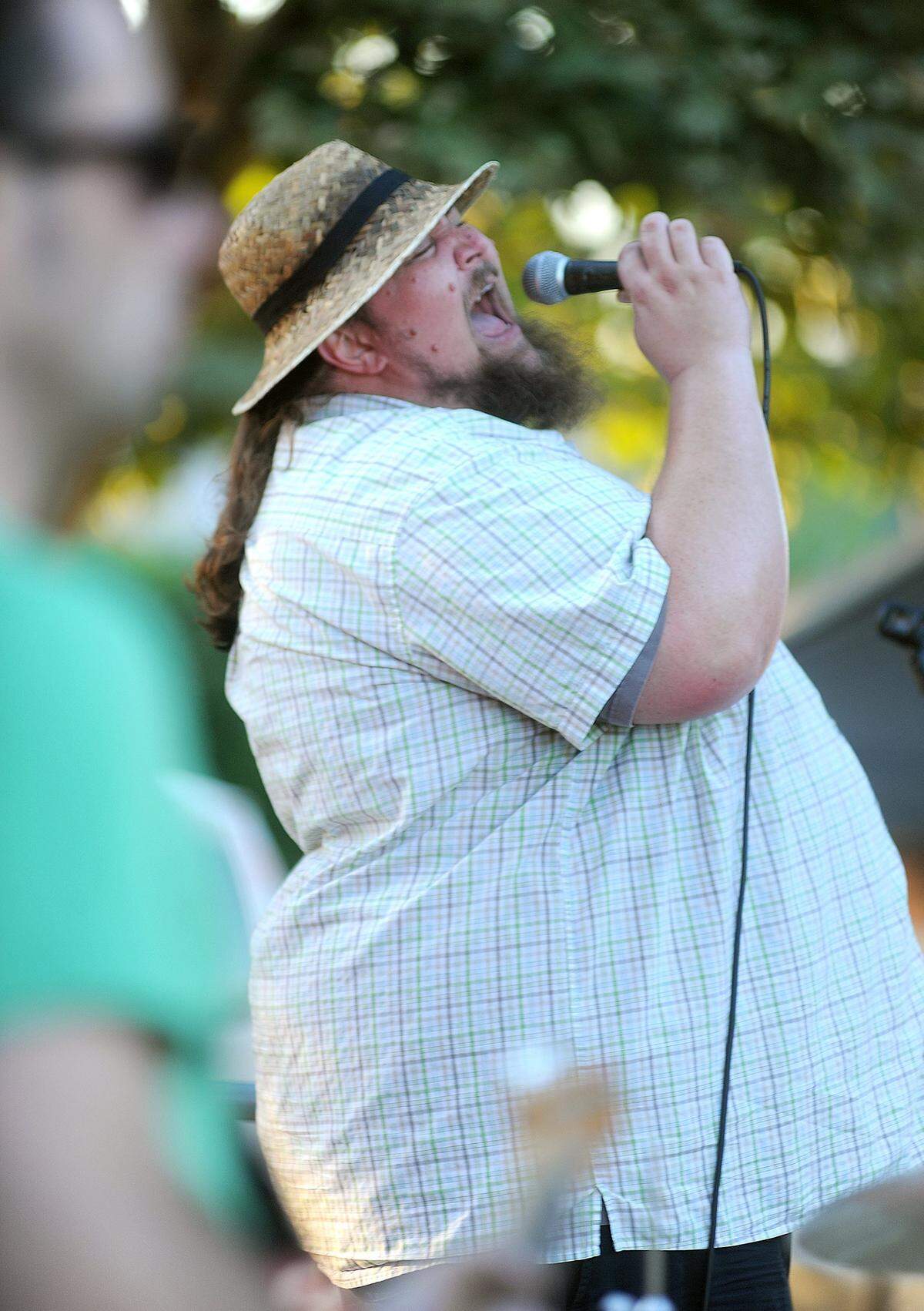 “Big” Earl Matthews of Big Earl and the Cryin’ Shame, belts out the lyrics to “Mustang Sally” while his band mates play along for those in attendance to Wednesday’s night out.