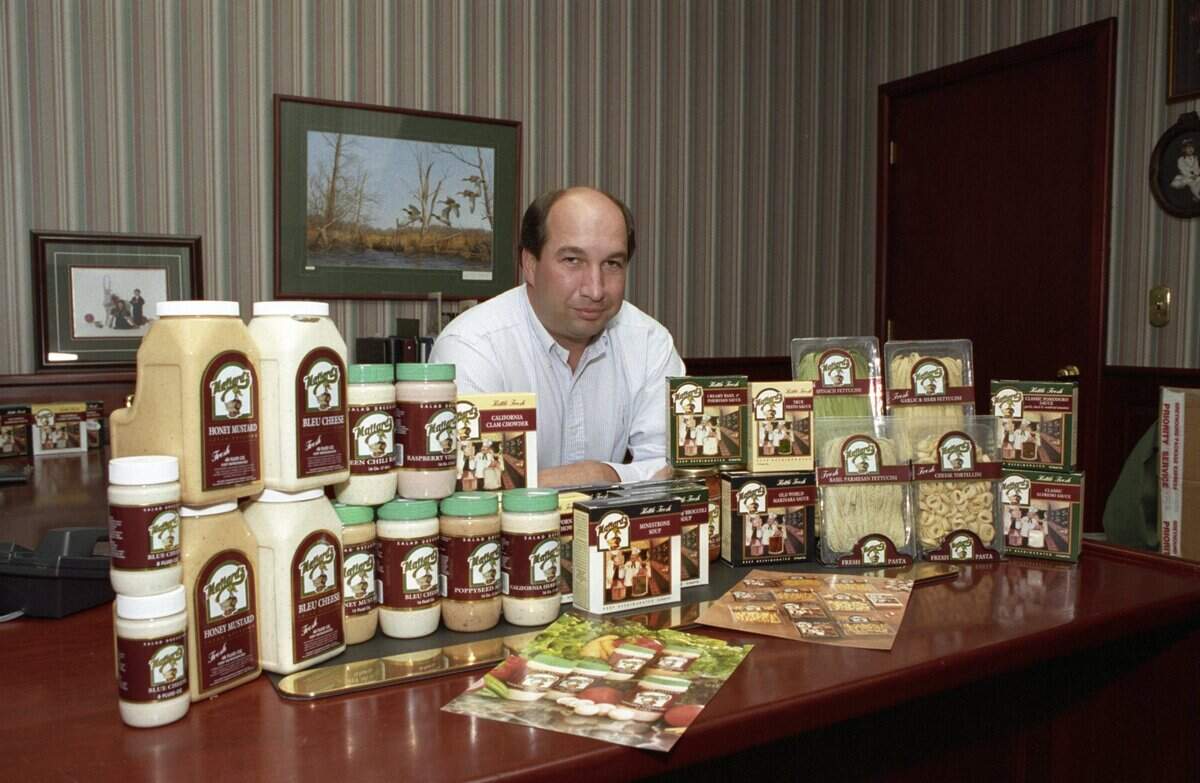 In 1992, Dan Costa displays a selection of his Mallard’s restaurant products.