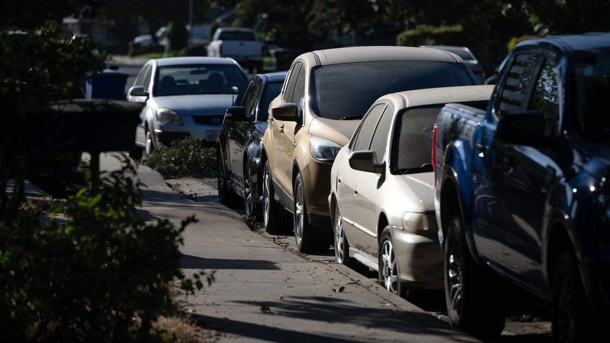 Cars are parked in a north Modesto neighborhood Friday, Oct. 6, 2023.