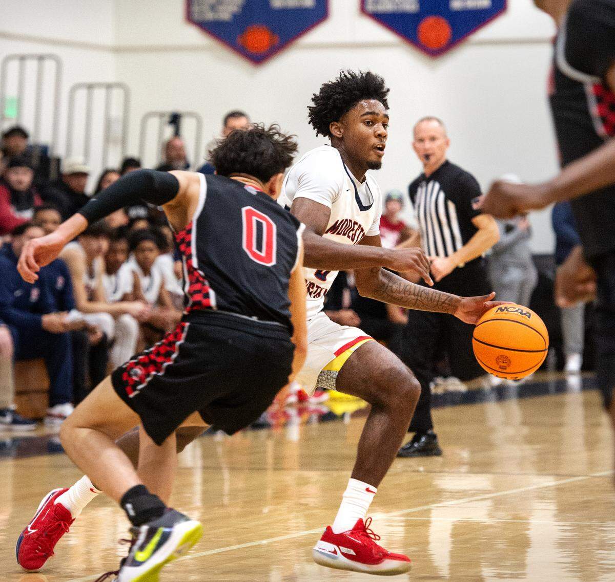 Modesto Christian’s Jalen Brown looks to pass during the Sac-Joaquin Section Division I playoff game with Lincoln at Modesto Christian High School in Salida, Calif., Friday, Feb. 17, 2023.