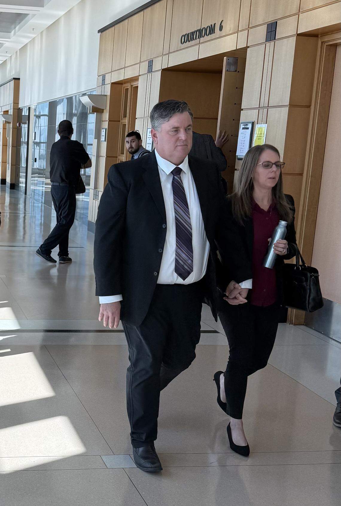 Former Patterson Joint Unified School District IT director Eric Drabert walks outside Courtroom 6 at the Robert T. Matsui Federal Courthouse in Sacramento after being sentenced Tuesday to 18 months in prison in a federal theft case.