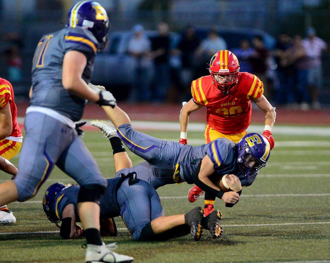 Escalon running back Jamin Miller (26) dives across the line for a first down during a game between Oakdale and Escalon at Oakdale High School in Oakdale, California, on September 15, 2023.