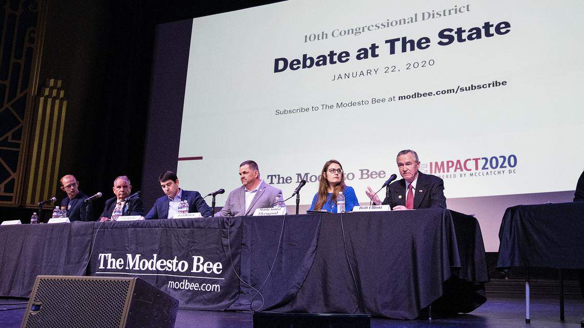 From the right, Bob Elliott, Marla Sousa Livengood, Ted Howze, Josh Harder, Mike Barkley and Ryan Blevins participate in the 10th Congressional District debate at the State Theatre in Modesto, Calif., on Wednesday, Jan. 22, 2020.