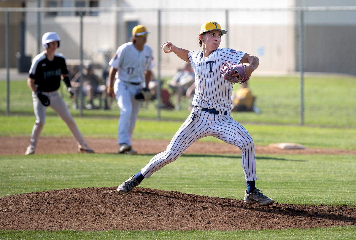 Turlock’s Jaron Rocha throws a pitch during the California Athletic League game with Pitman at Turlock High School in Turlock, Monday, April 14, 2025.