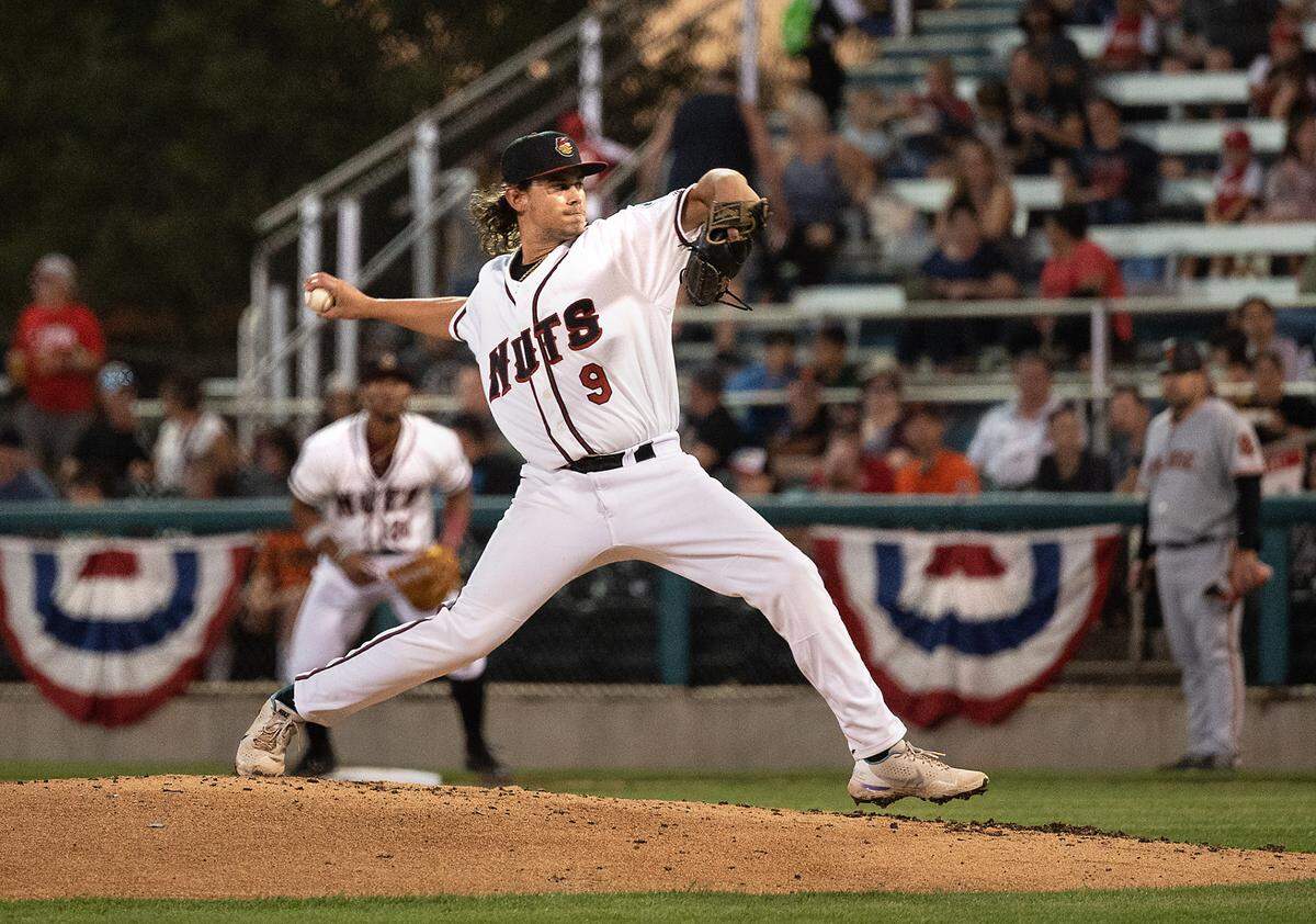 Modesto Nuts’s Michael Morales delivers a pitch during the opening day baseball game with the San Jose Giants at John Thurman Field in Modesto, Calif., on Friday, April 8, 2022. Morales got the win as Modesto won the game 5-3.