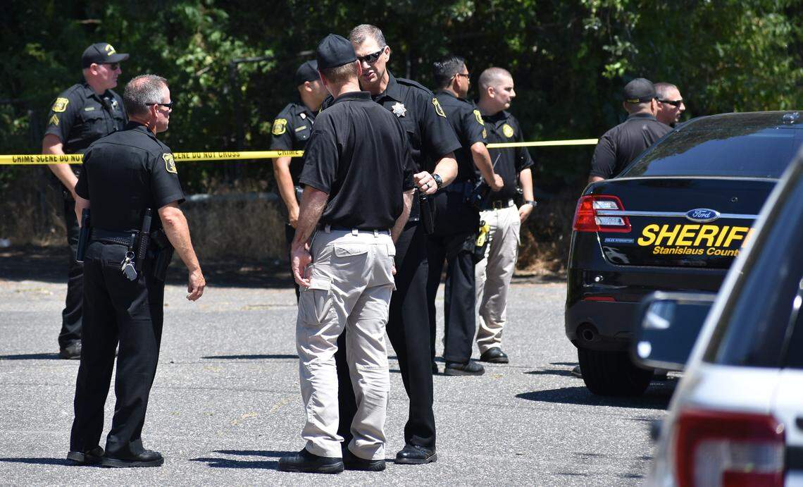Stanislaus County Sheriff's Department personnel work the scene of a deputy-involved shooting at a home on Burneyville Road in Riverbank on May 29.