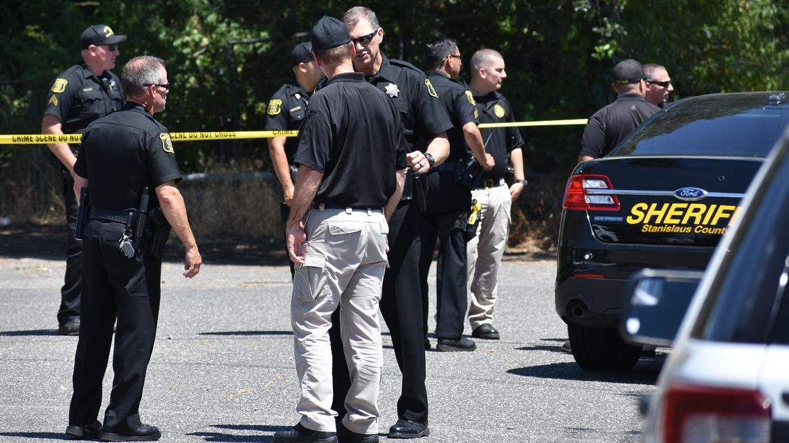 Stanislaus County Sheriff's Department personnel work the scene of a deputy-involved shooting at a home on Burneyville Road in Riverbank on May 29.
