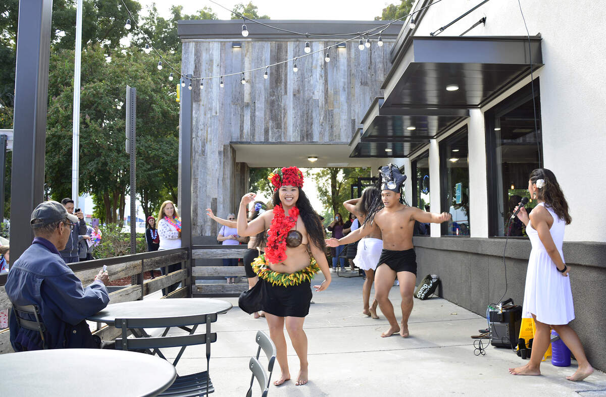 Hawaiian dancers are pictured Friday October 18, 2019 during the grand opening of the new Ono Hawaiian BBQ in Modesto, Calif.