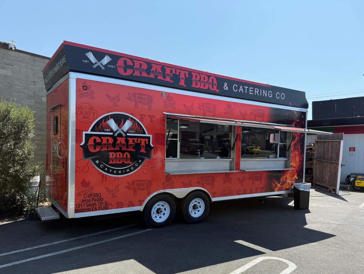 The Craft BBQ & Catering Co. food trailer sits behind the building with the same name at 3008 McHenry Ave. in Modesto, Calif.