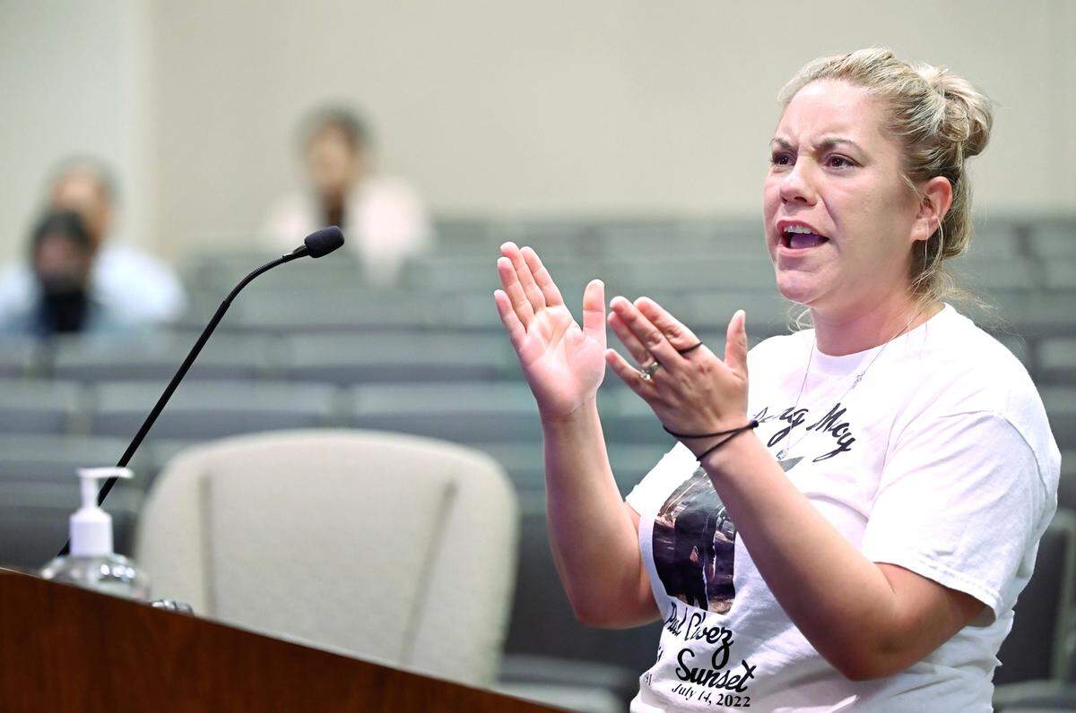 Brittoni Estrella Chavez, widow of Paul Chavez Jr., speaks during public comment at the Modesto city council meeting in Modesto, Calif., on August 23, 2022.