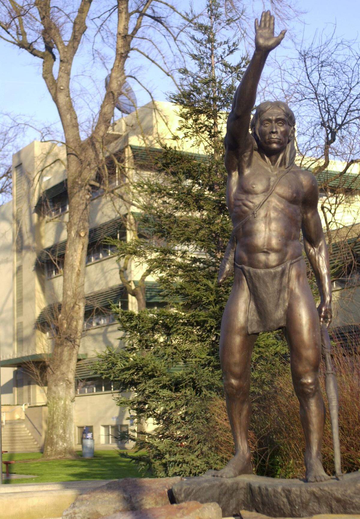 The statue of Chief Estanislao is pictured in February 2003 with the Stanislaus County Courthouse and offices in the background on the corner of I and 11th Streets in downtown Modesto.