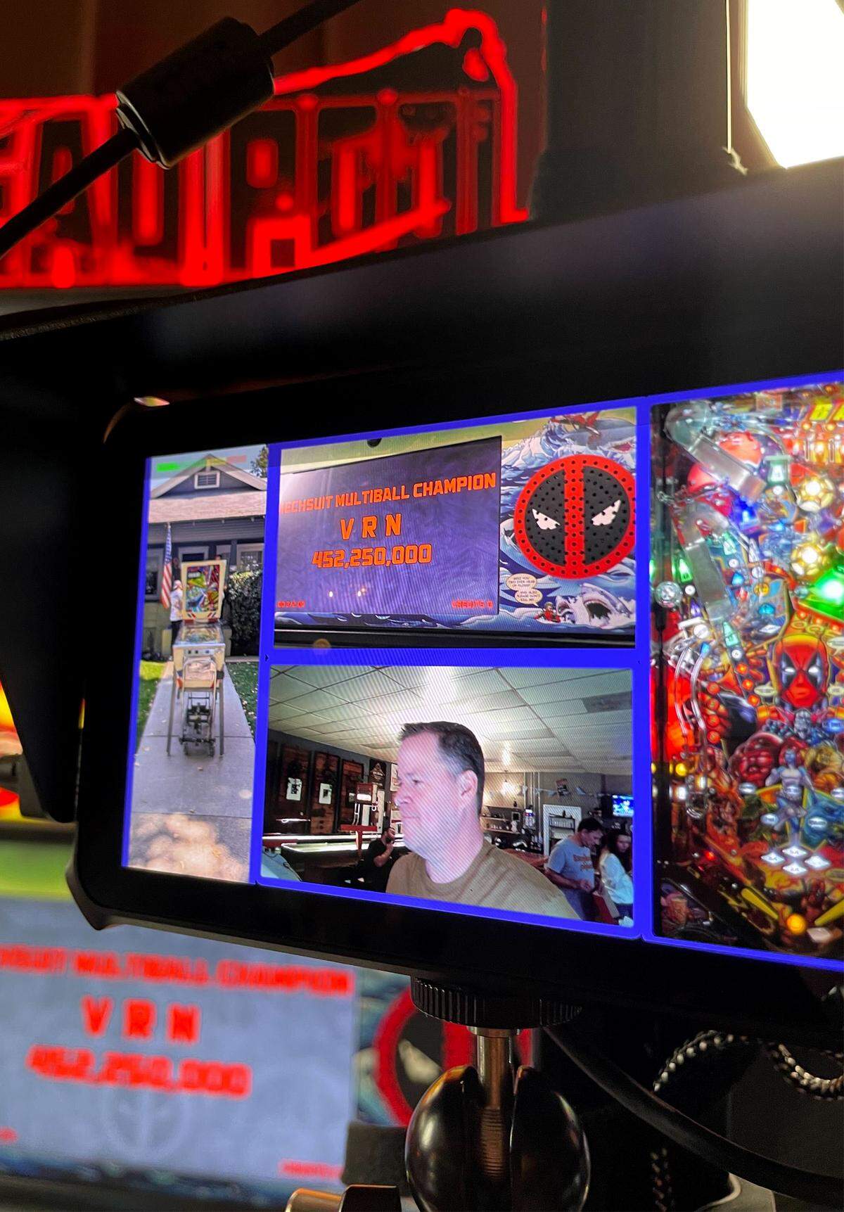 David Stoddard sets up a pinball recording system for viewers on Twitch before a tournament at Contentment Brewing in Modesto on  Wednesday, Sept. 24, 2025. 