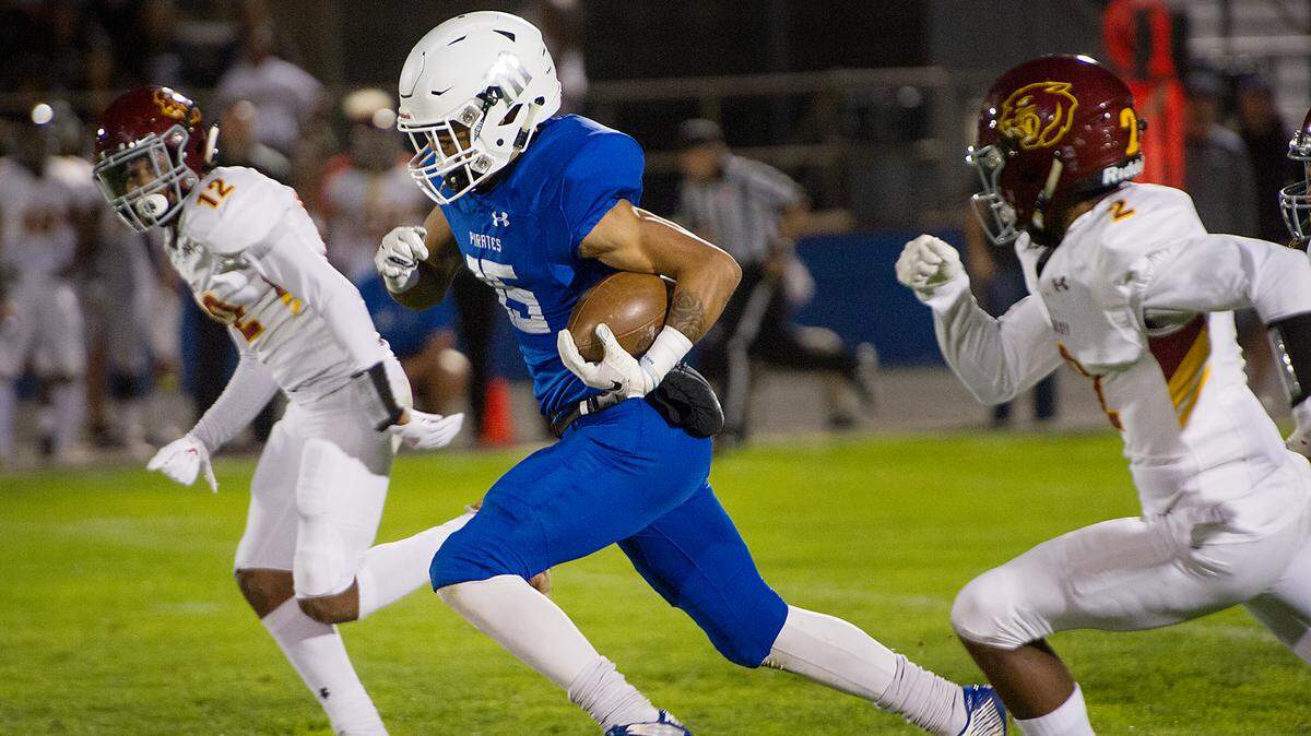 Modesto’s Devan Bass breaks free for a big gain during the Big 8 Conference game with Sacramento City College at Modesto Junior College in Modesto, Calif., Saturday, Nov. 3, 2018. Modesto won the game 27-24.