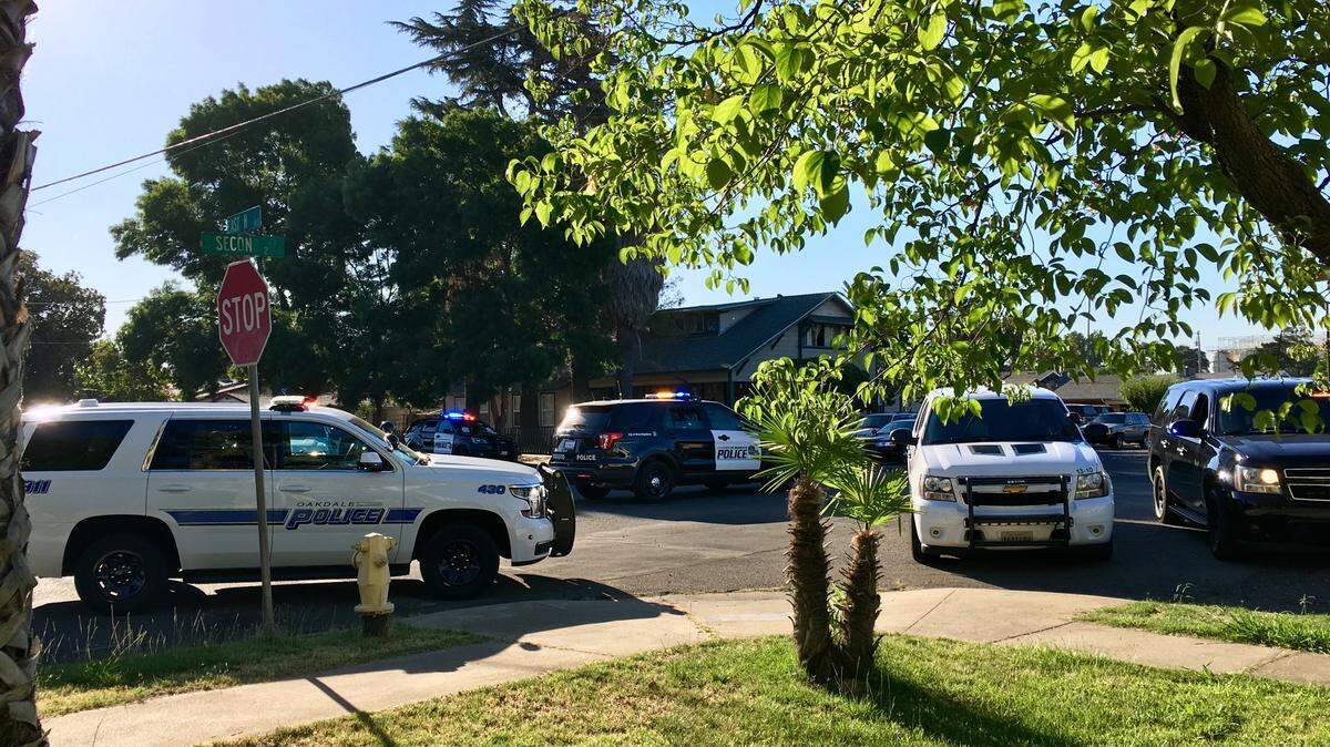 Oakdale and Modesto police on scene in Oakdale where perpetrators of a Modesto residential robbery were sought Wednesday, July 11, 2018.
