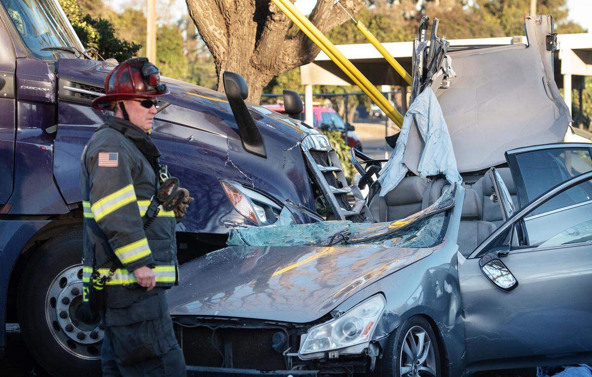 Modesto firefighters and police respond to a fatal accident Briggsmore Avenue and Carver Road in Modesto, Calif., on Tuesday, Feb. 1, 2022.