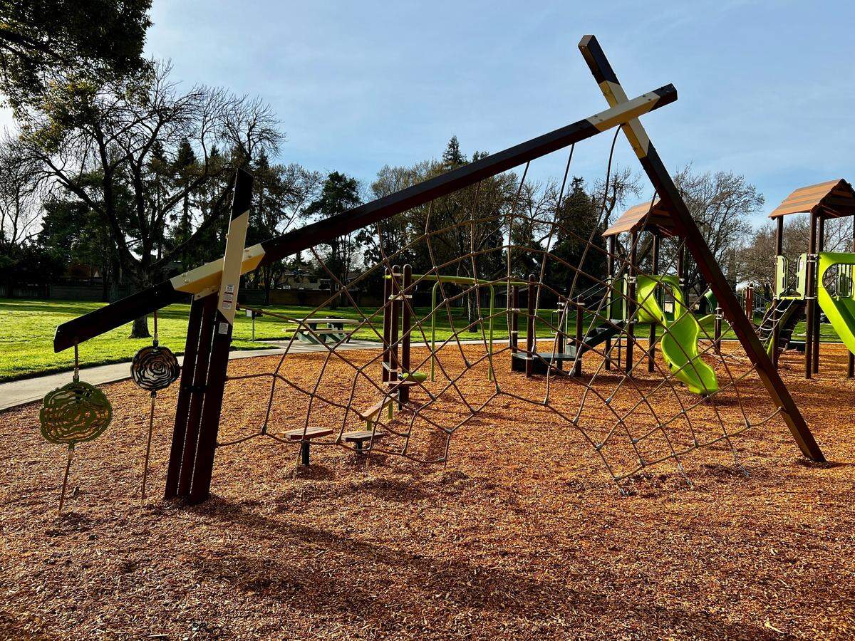 The new playground at Lakewood Park in Modesto, Calif., has tree house themed structures.