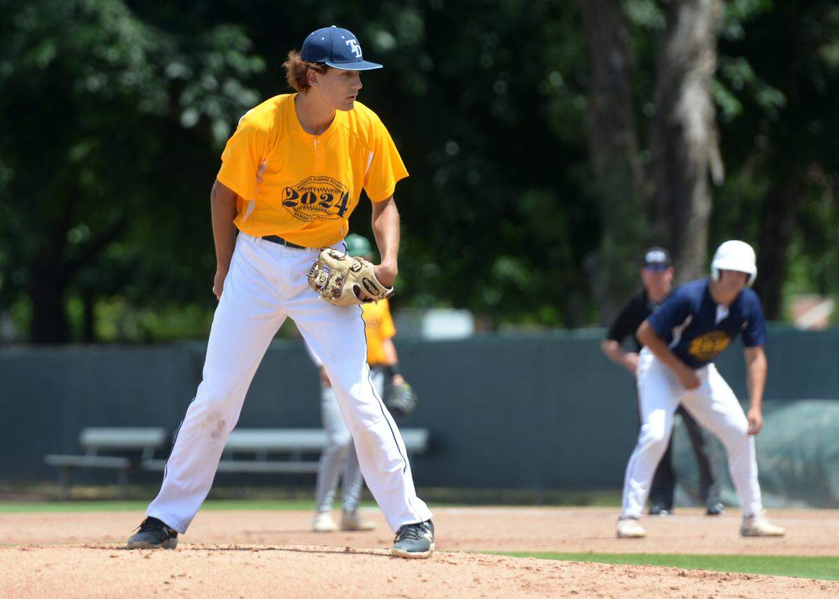 Downey High senior pitcher Aiden Larson prepares to deliver a pitch during the 32nd Modesto Sunrise Rotary All-Star Game at CSU Stanislaus on Saturday, June 8, 2024.