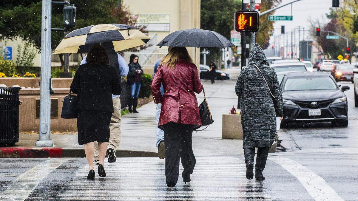 It seems so long ago. The umbrellas came out as more than half an inch of rain fell in Modesto on Dec. 2.