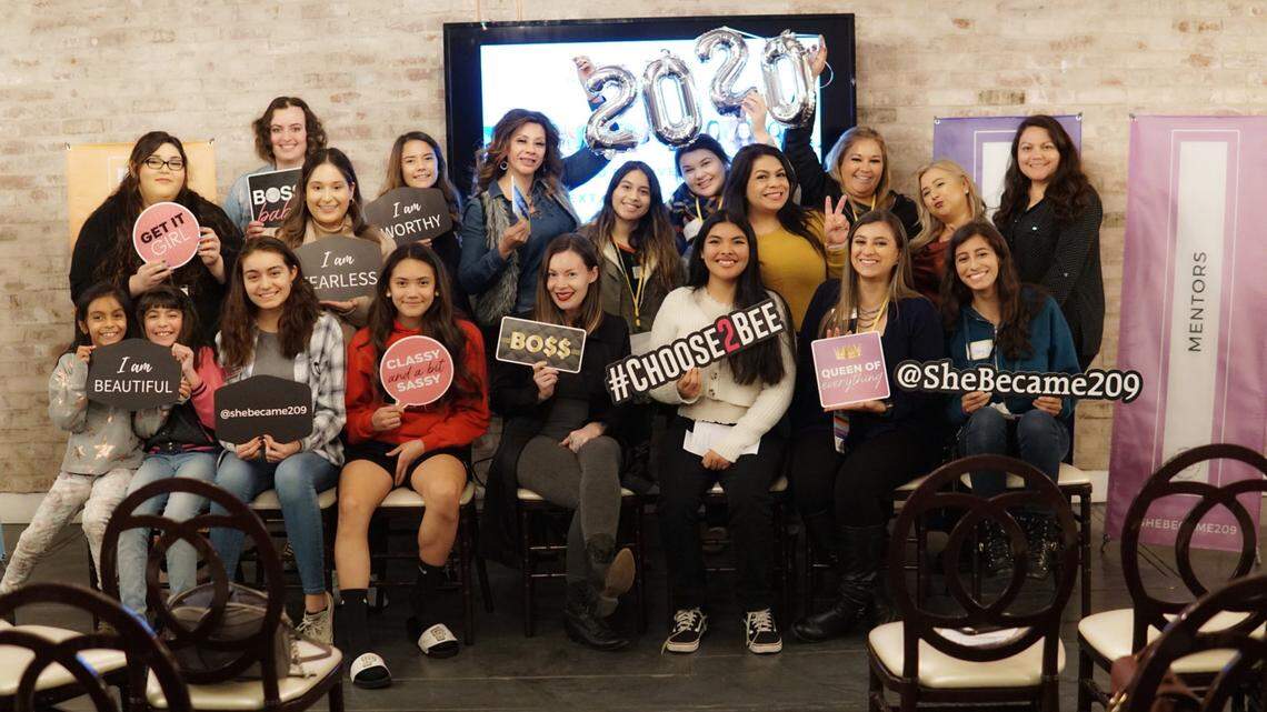 SheBecame members gathered for a photo after partciapating in an interactive workshop.