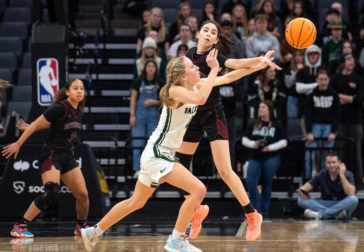 Riverbank’s Livi Fernandez defends on Colfax’s Maycee Heimann during the Sac-Joaquin Section Division IV championship game at Golden 1 Center in Sacramento, Calif., Friday, Feb. 24, 2023. Colfax won the game 56-38.