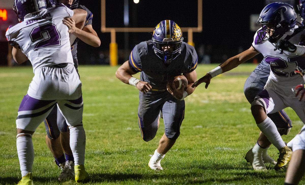 Escalon’s Ryker Peters runs in for a touchdown during the first round playoff game with Pacheco in Escalon, Calif., Friday, Nov. 4, 2022.