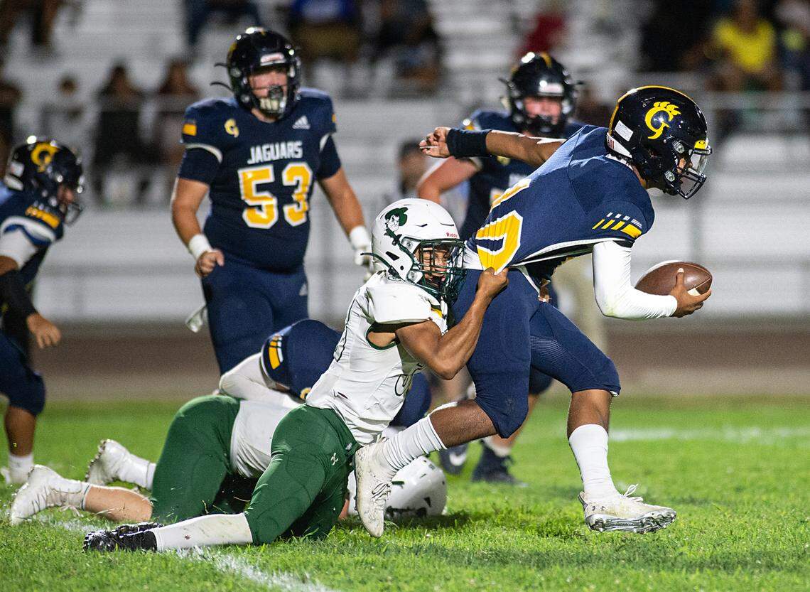 Gregori quarterback Cruz Marines runs the ball during the non-league game with Livermore in Salida, Calif., on Friday, Sept. 10, 2021.