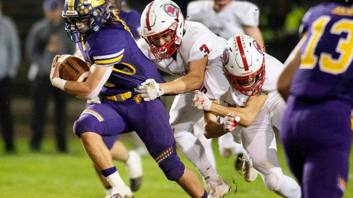 Escalon’s Ryker Peters runs the ball during the CIF Sac-Joaquin Division V semifinal game with Ripon in Escalon, Calif., on Friday, Nov. 19, 2021. Escalon won the game 34-10.