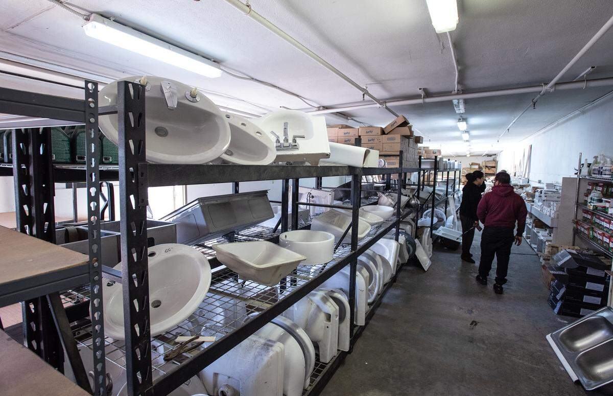 Customers look at items at the Habitat for Humanity ReStore on Kearney Avenue in Modesto, Calif., on Friday, April 15, 2022.