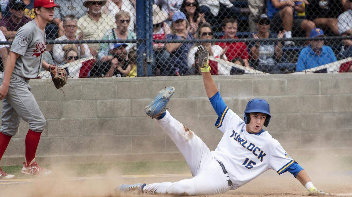 Turlock’s Tyler Soderstrom scores ahead of the throw during the Sac-Joaquin Section baseball playoff game with Lincoln at Turlock High School in Turlock, Calif., Tuesday, May 14, 2019. Soderstrom was named the Central California Athletic League’s Most Valuable Player on Thursday.