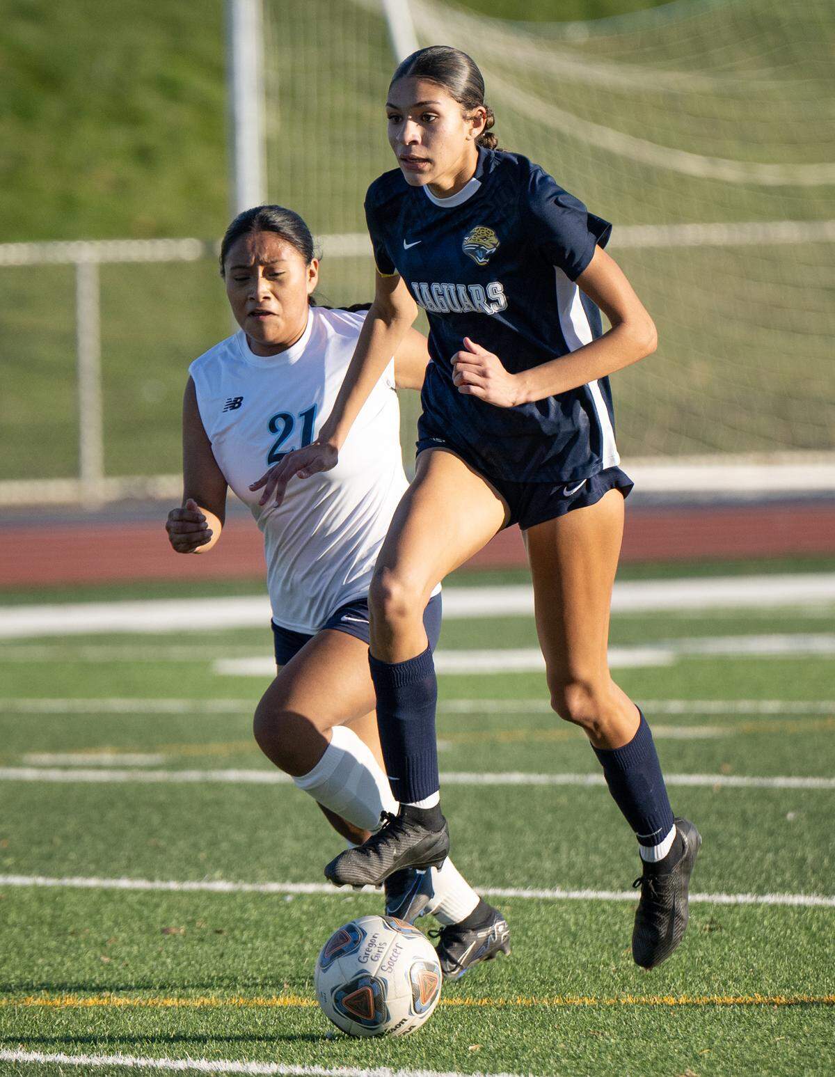 Gregori’s Kylie Farmer looks to pass off the ball during the Central California Athletic League game with Downey at Gregori High School in Modesto, Thursday, Jan. 9, 2024.
